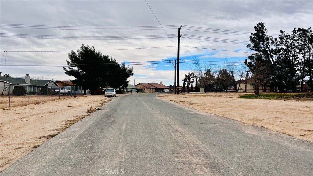 43431107 Kiowa Road Apple Valley, CA 92308 - Photo 15 of 16 a view of road with a building in the background