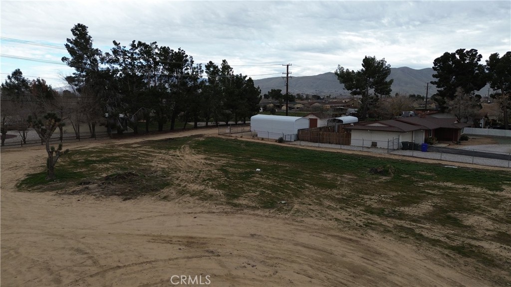 43431107 Kiowa Road Apple Valley, CA 92308 - Photo 8 of 16 a view of a lake with houses