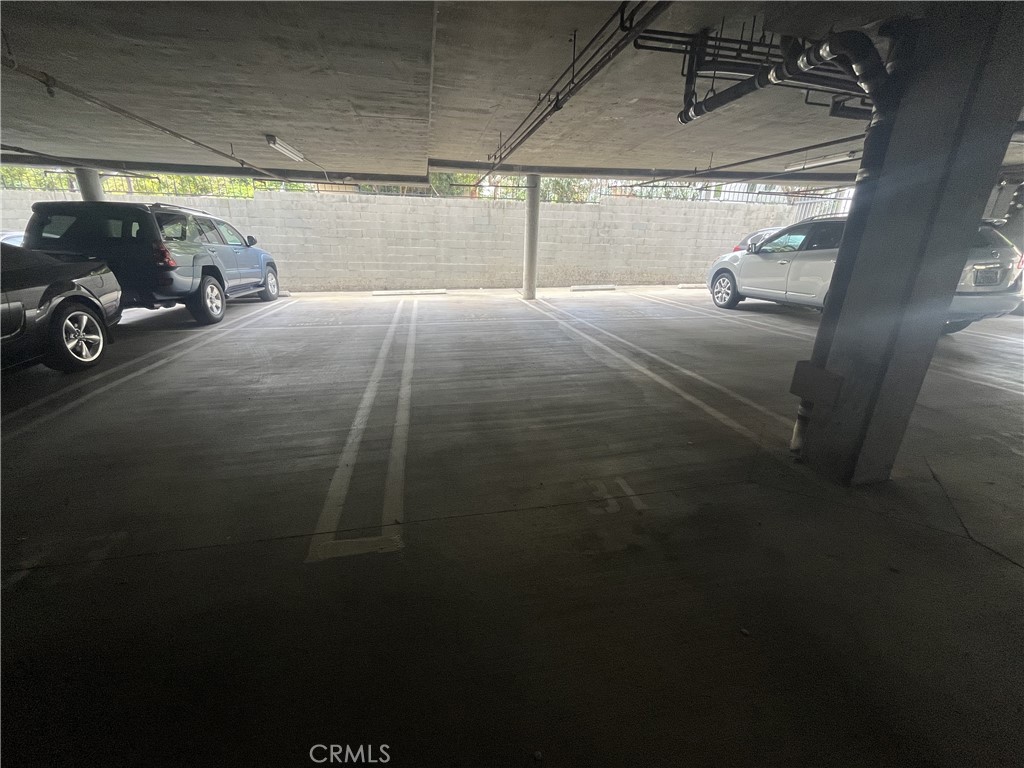12211 Idaho Avenue, Unit 101 Los Angeles, CA 90025 - Photo 16 of 21 a view of parking garage with cars