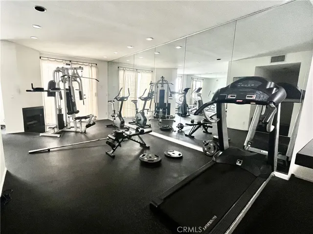 a view of a room with gym equipment