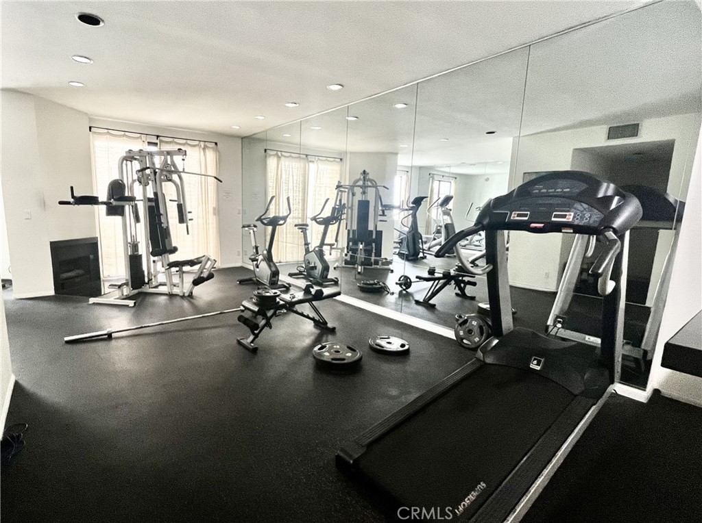 12211 Idaho Avenue, Unit 101 Los Angeles, CA 90025 - Photo 19 of 21 a view of a room with gym equipment