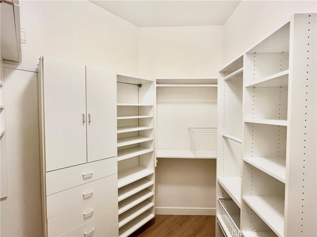 12211 Idaho Avenue, Unit 101 Los Angeles, CA 90025 - Photo 10 of 21 a view of walk in closet with empty racks