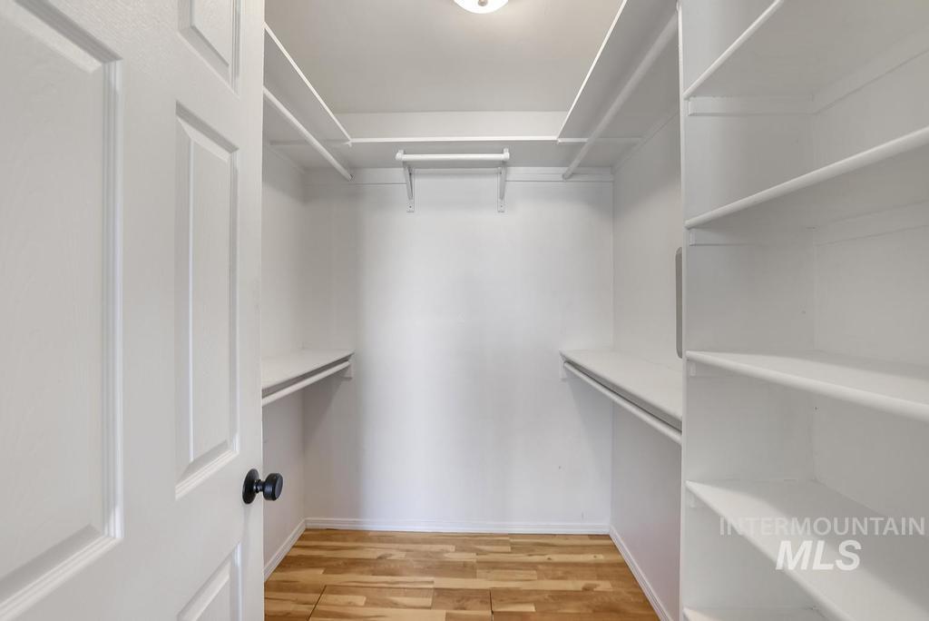 1393 Valencia Street Twin Falls, ID 83301 - Photo 23 of 44 Walk in closet with light wood-type flooring