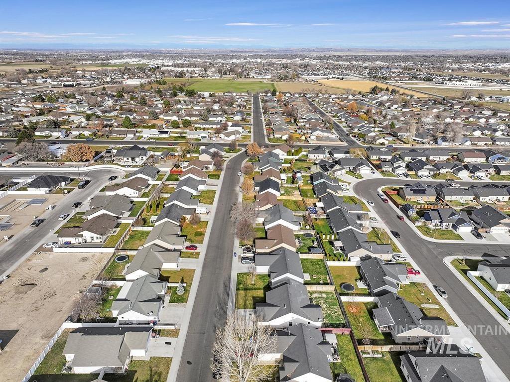 1393 Valencia Street Twin Falls, ID 83301 - Photo 30 of 44 Aerial view of property and surrounding area with nearby suburban area