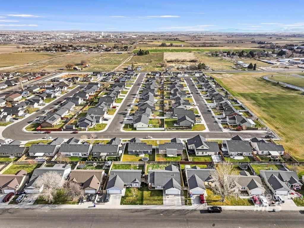1393 Valencia Street Twin Falls, ID 83301 - Photo 33 of 44 Aerial view of property and surrounding area featuring nearby suburban area