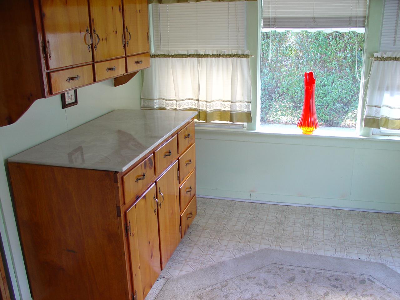 4463 Daugherty Road Salem, VA 24153 - Photo 11 of 18 a view of a kitchen with a sink and wooden floor