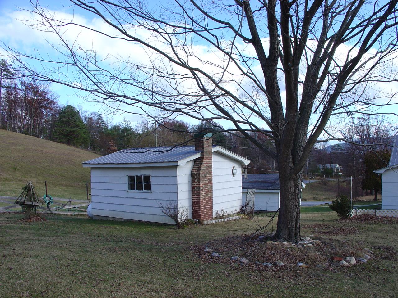 4463 Daugherty Road Salem, VA 24153 - Photo 15 of 18 a view of a house with a backyard