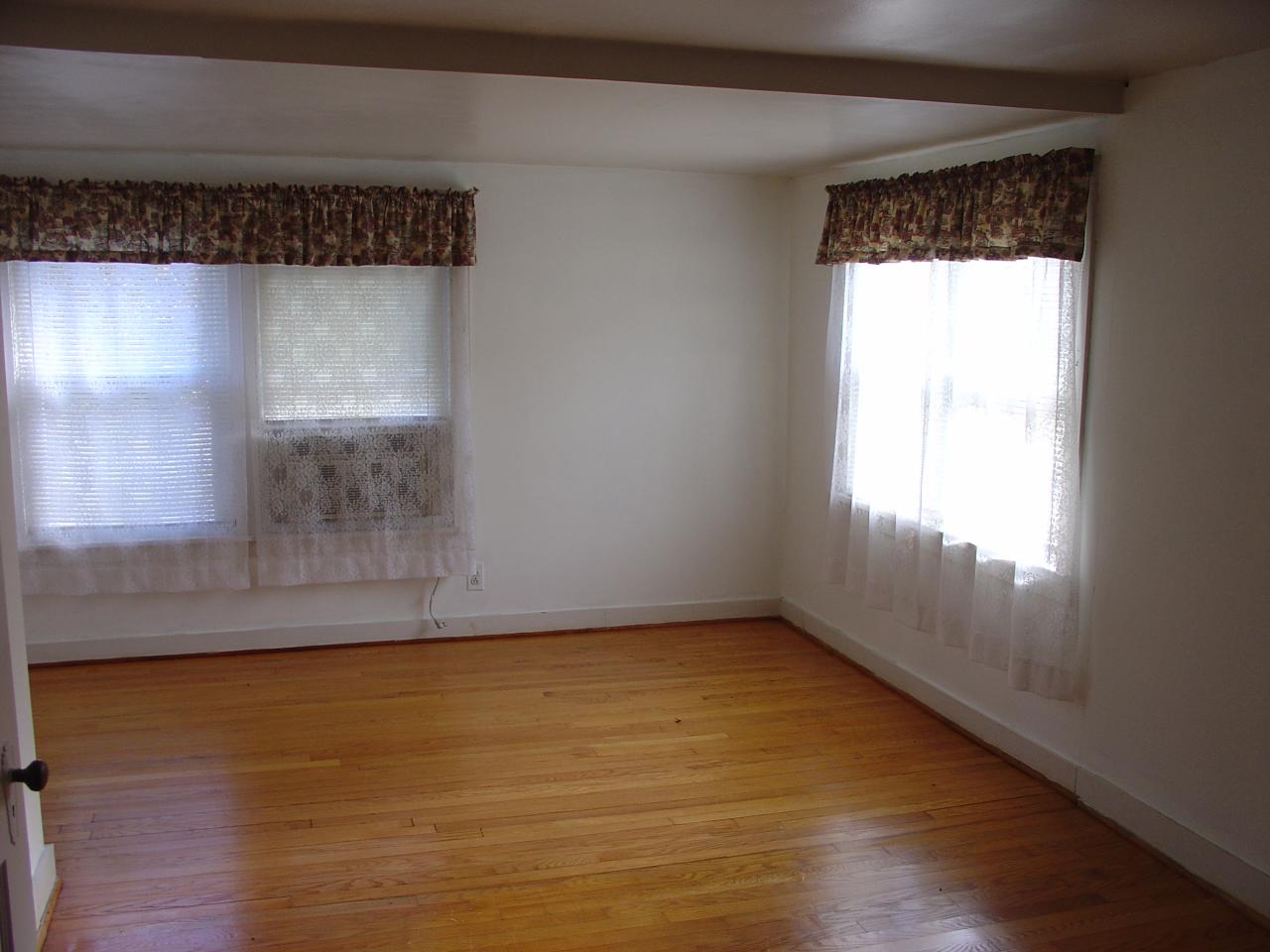 4463 Daugherty Road Salem, VA 24153 - Photo 6 of 18 a view of a small space with wooden floor and a window