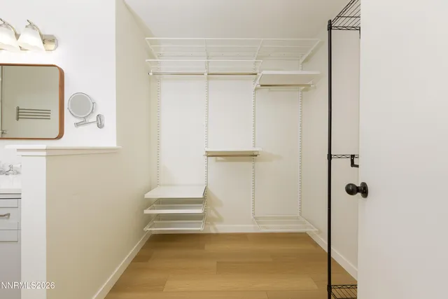 a view of a house with snow on the road