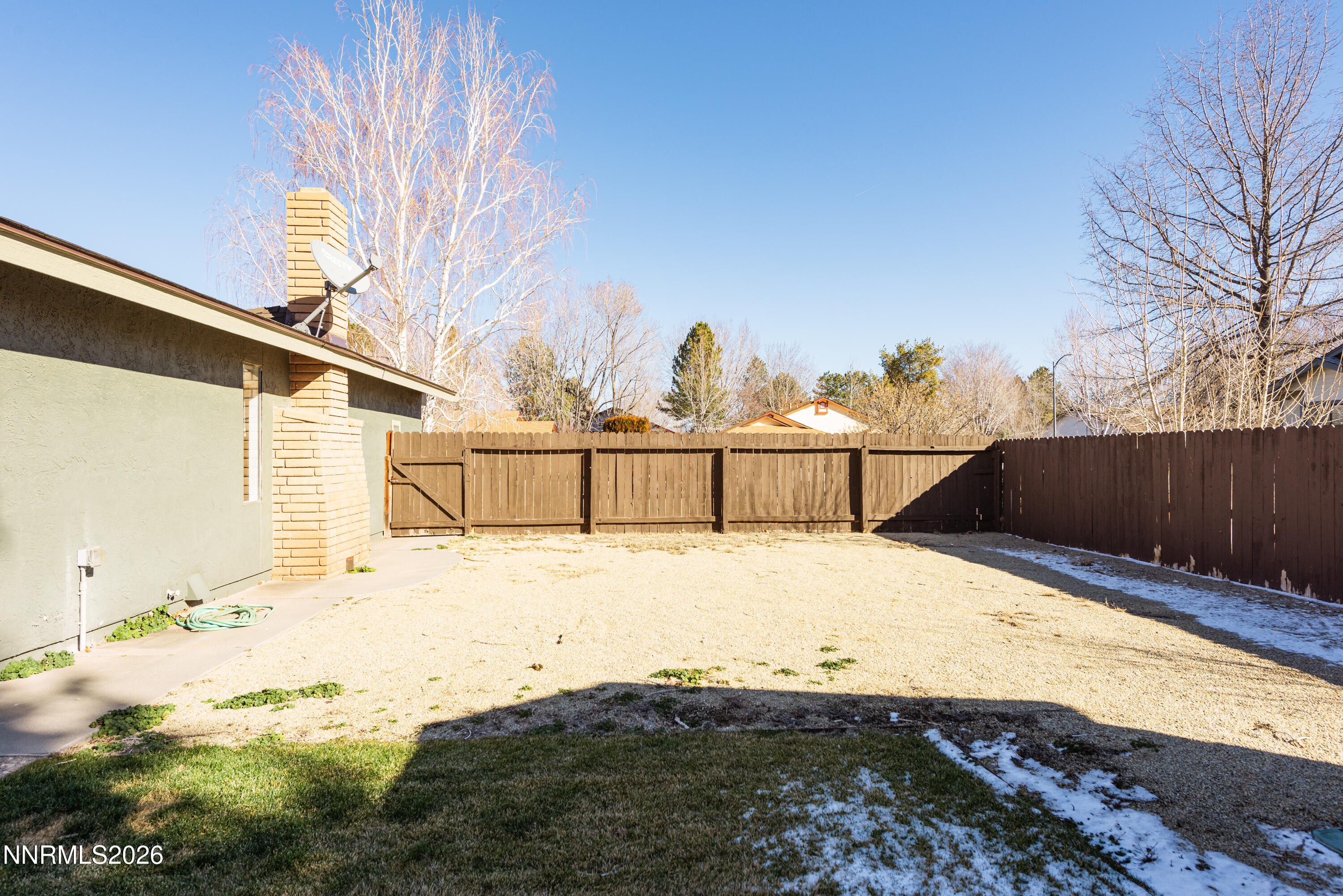 837 Mahogany Drive Minden, NV 89423 - Photo 23 of 31 a street view with wooden fence