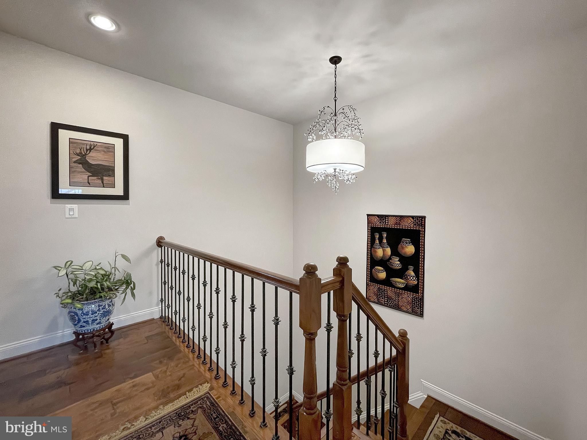 43080 Old Ryan Road Ashburn, VA 20148 - Photo 24 of 64 Stairwell with custom rod iron railings