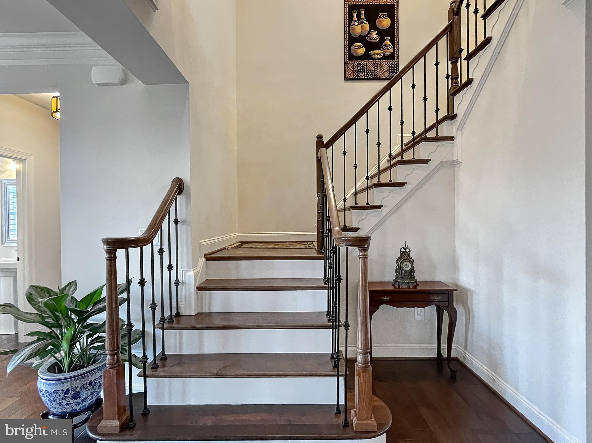 43080 Old Ryan Road Ashburn, VA 20148 - Photo 7 of 64 Stairwell with custom rod iron railings