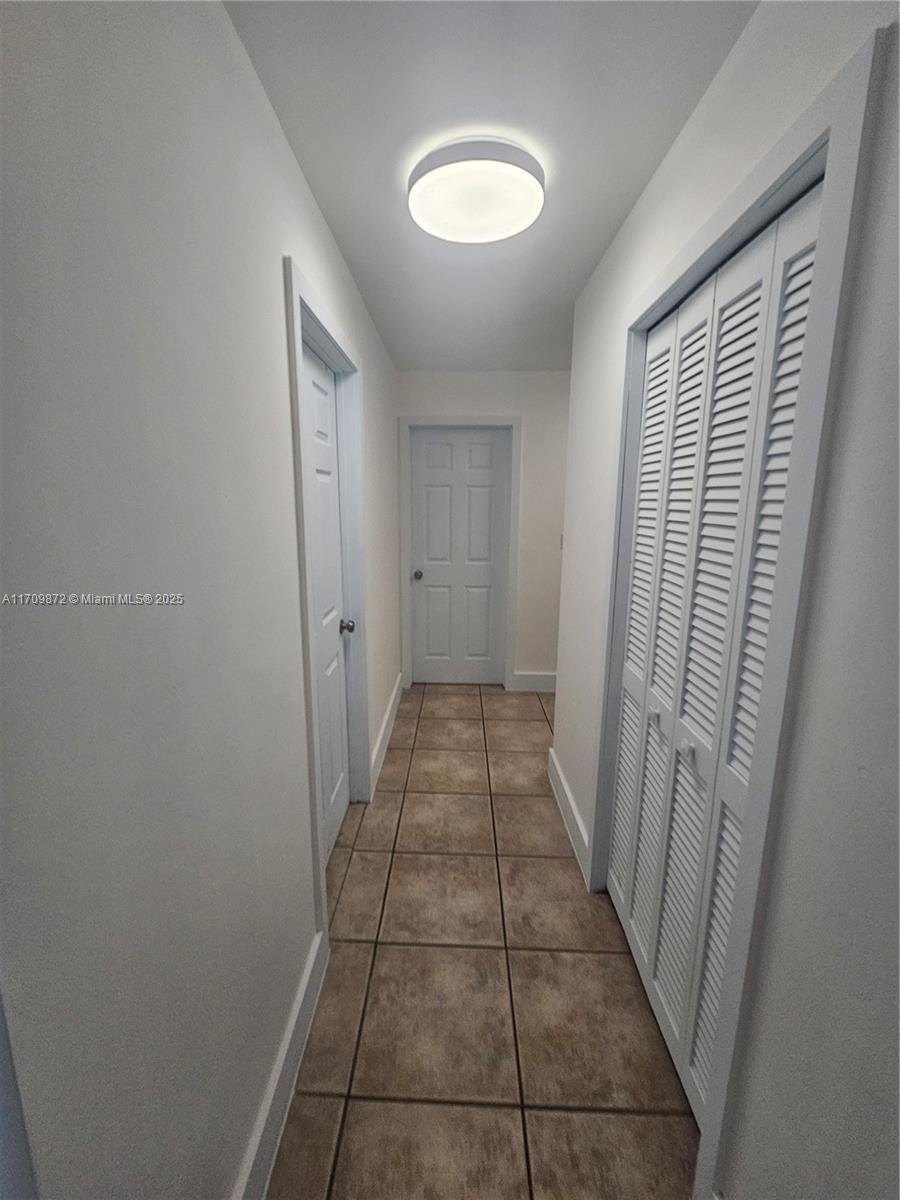 14461 Southwest 152nd Court Miami, FL 33196 - Photo 22 of 30 a view of a hallway