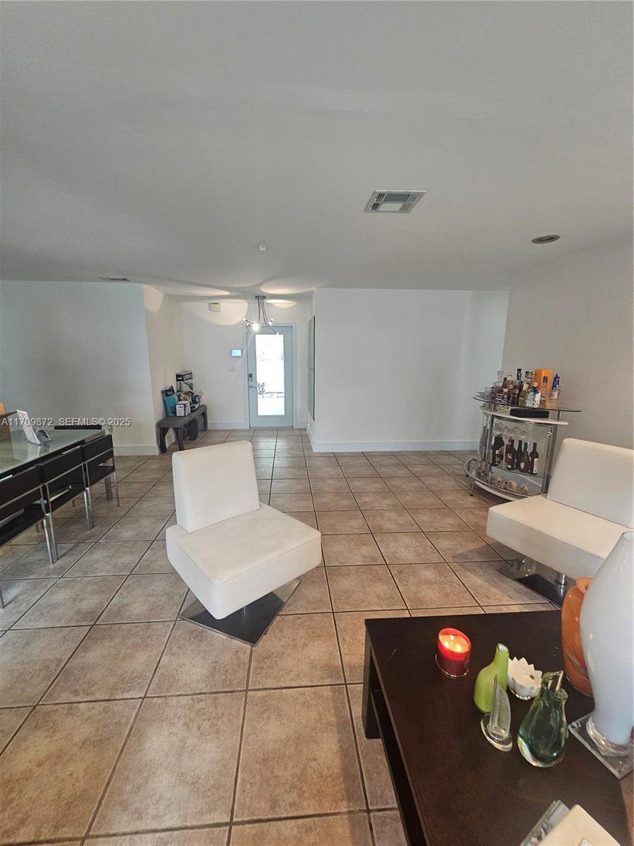 14461 Southwest 152nd Court Miami, FL 33196 - Photo 7 of 30 a living room with furniture