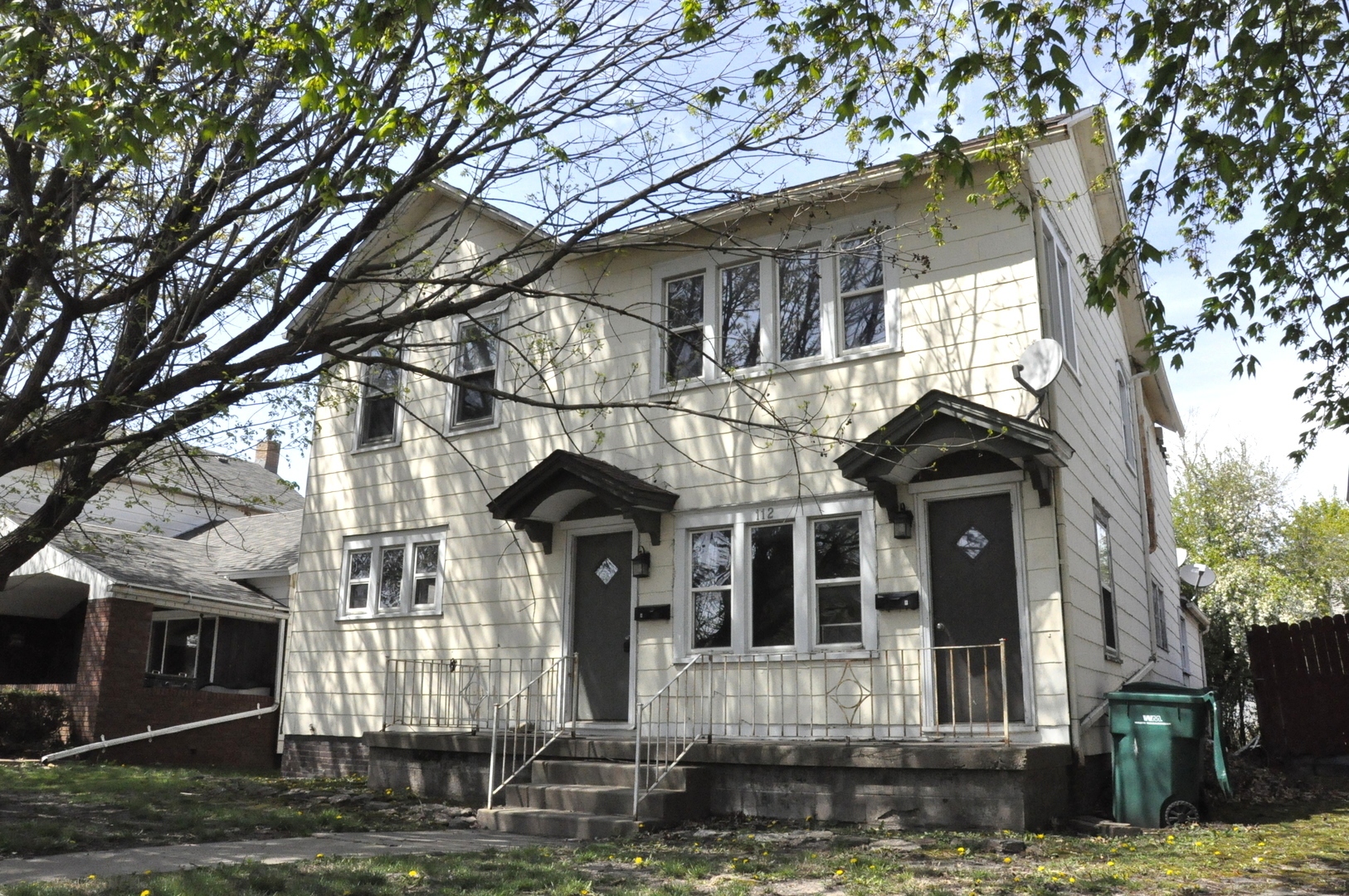112 East Morrell Street Streator, IL 61364 - Photo 1 of 61 a front view of a house with a tree
