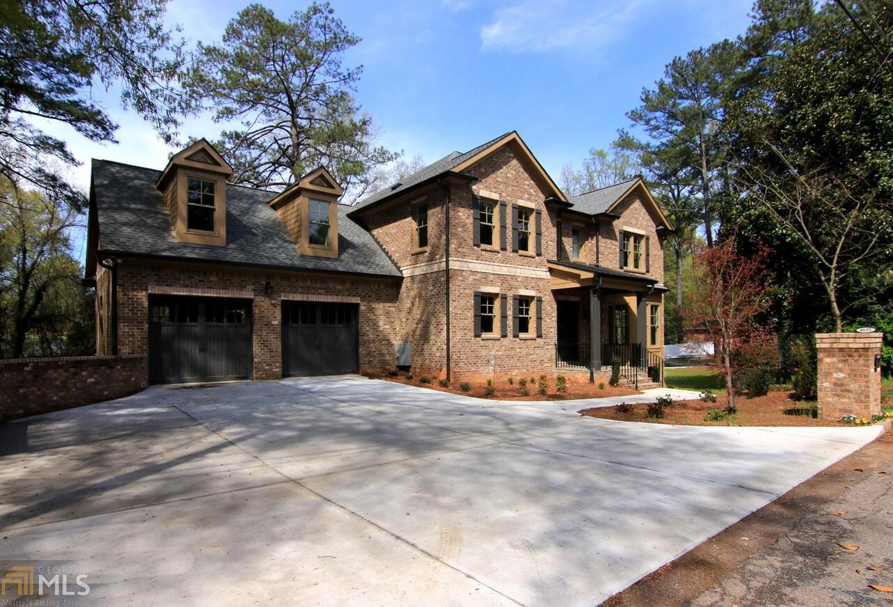 4632 Dalmer Road Northeast, Unit 5 Atlanta, GA 30342 - Photo 1 of 1 Move In ready four-sided brick with full-finished basement in best area of Atlanta. Extra parking area off driveway. Quiet street parking in front