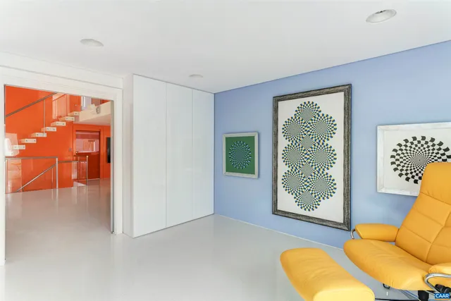 a dinning table and chairs in a room