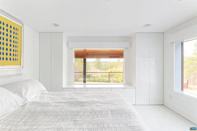 a bathroom with a shower and a bath tub