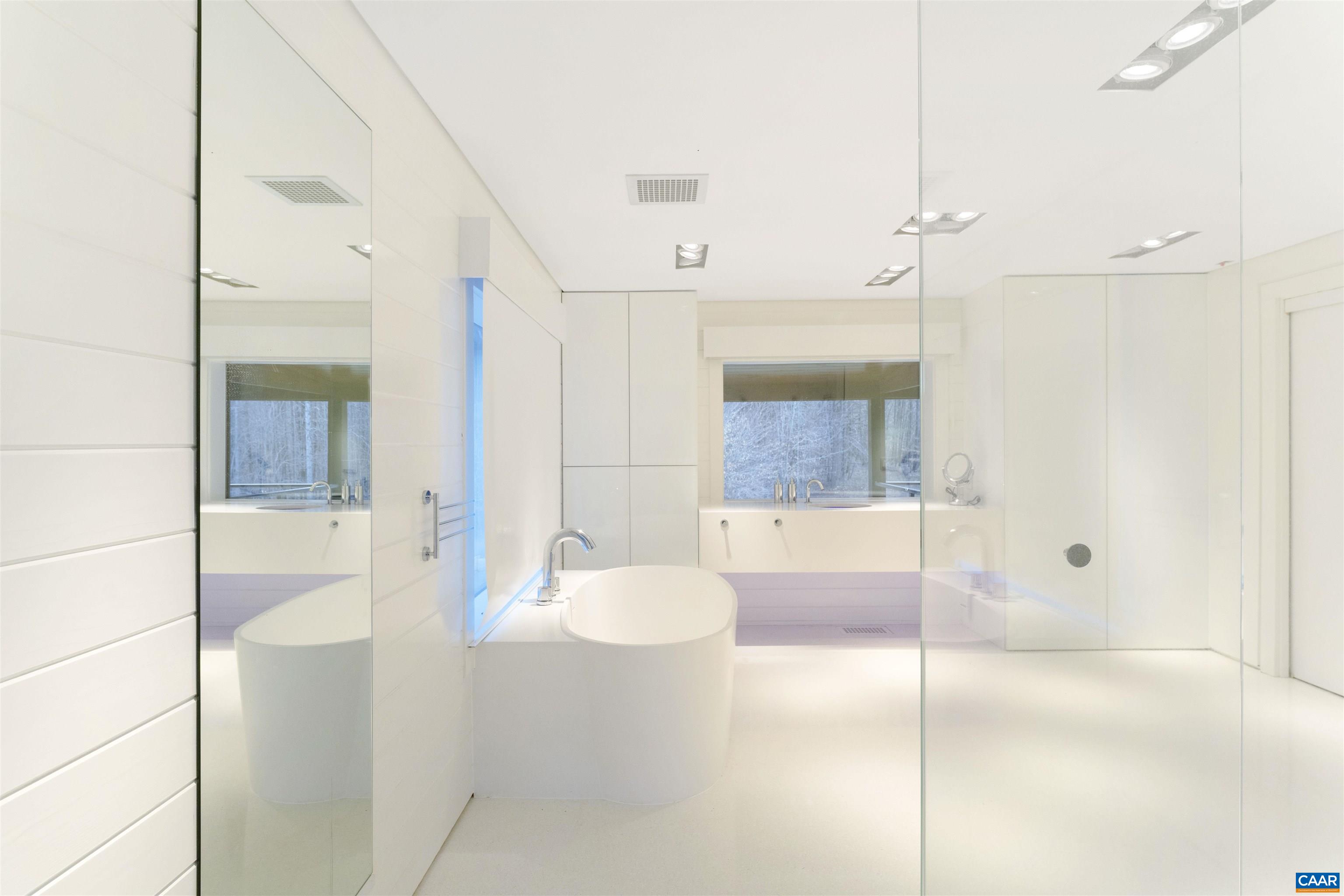 4323 Carter Road Schuyler, VA 22969 - Photo 20 of 54 a bathroom with a tub shower and sink