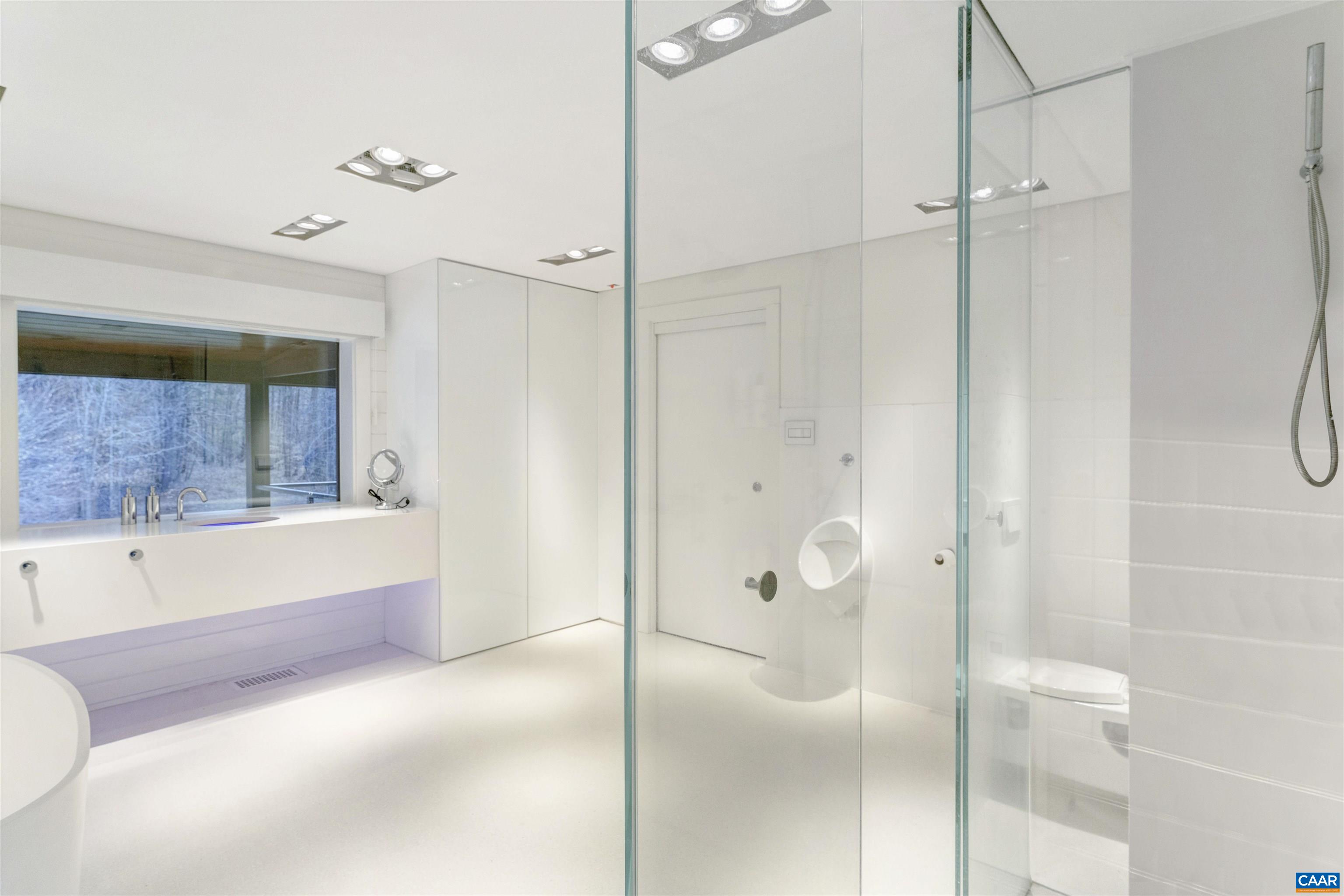 4323 Carter Road Schuyler, VA 22969 - Photo 21 of 54 a bathroom with a shower and a bath tub