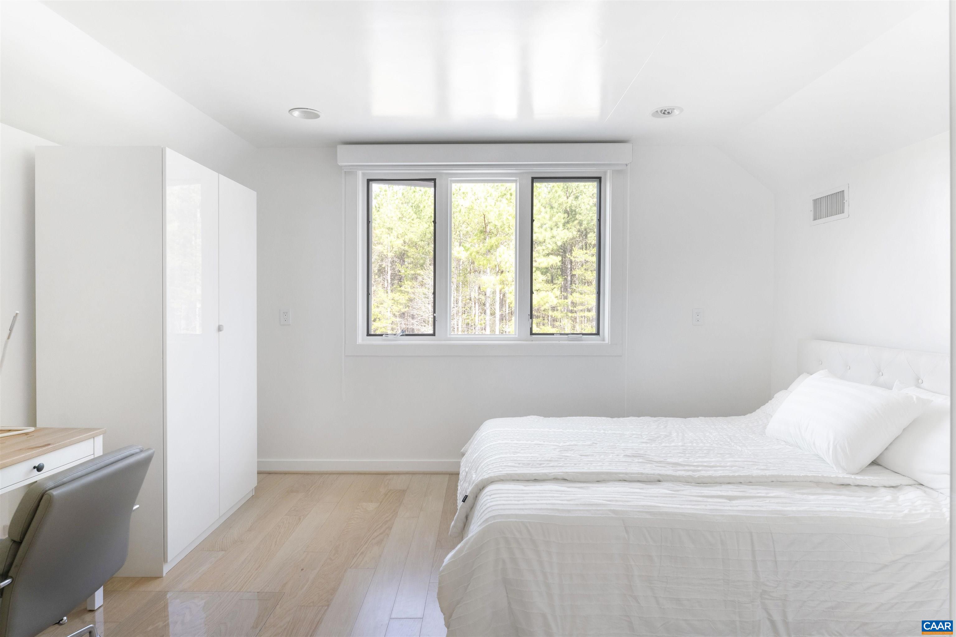 4323 Carter Road Schuyler, VA 22969 - Photo 27 of 54 a bed room with a bed and a window