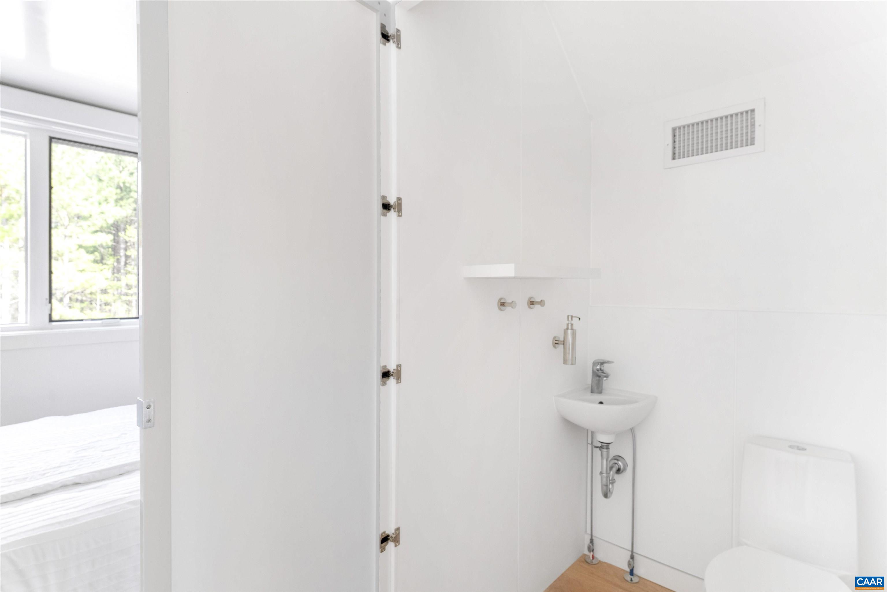 4323 Carter Road Schuyler, VA 22969 - Photo 29 of 54 a bathroom with a shower and a sink