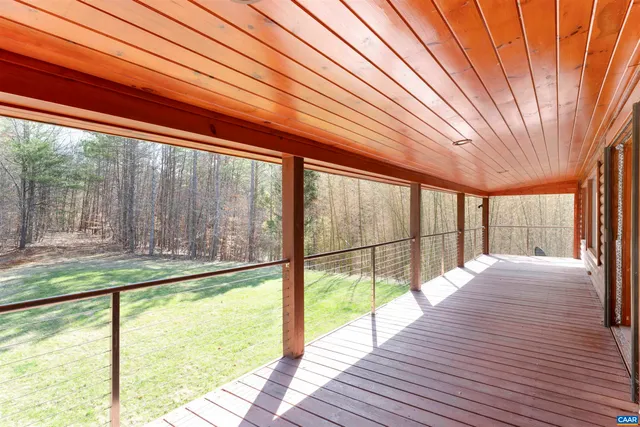 a view of a room with a large window