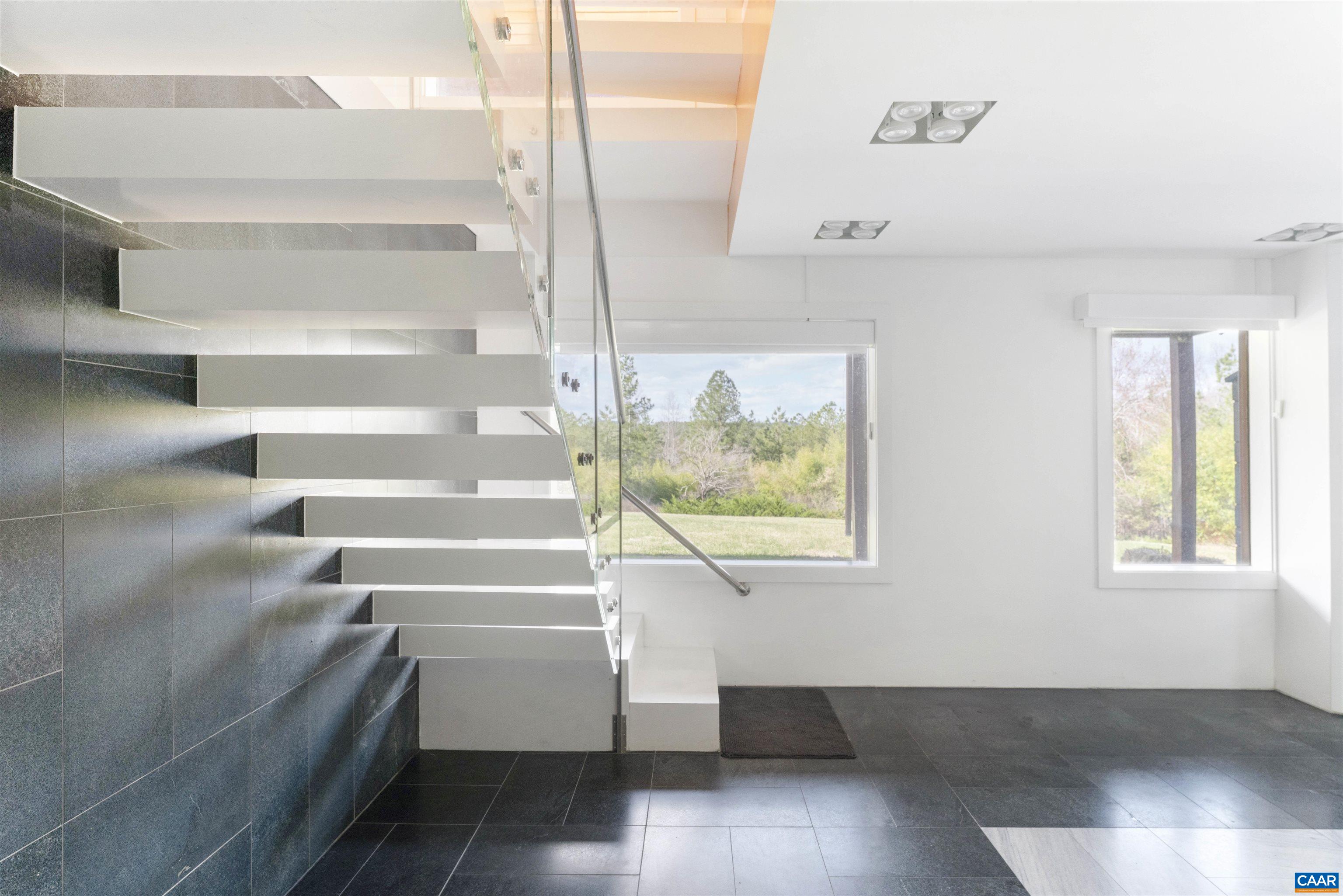 4323 Carter Road Schuyler, VA 22969 - Photo 35 of 54 a view of entryway and hall with wooden floor