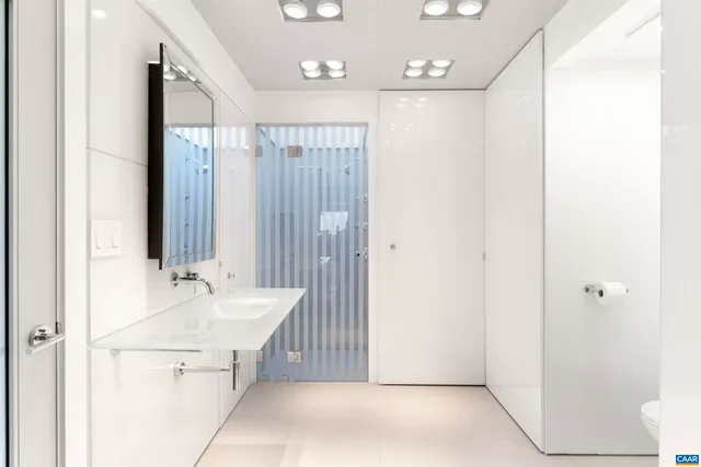 a view of a room with porch and a backyard