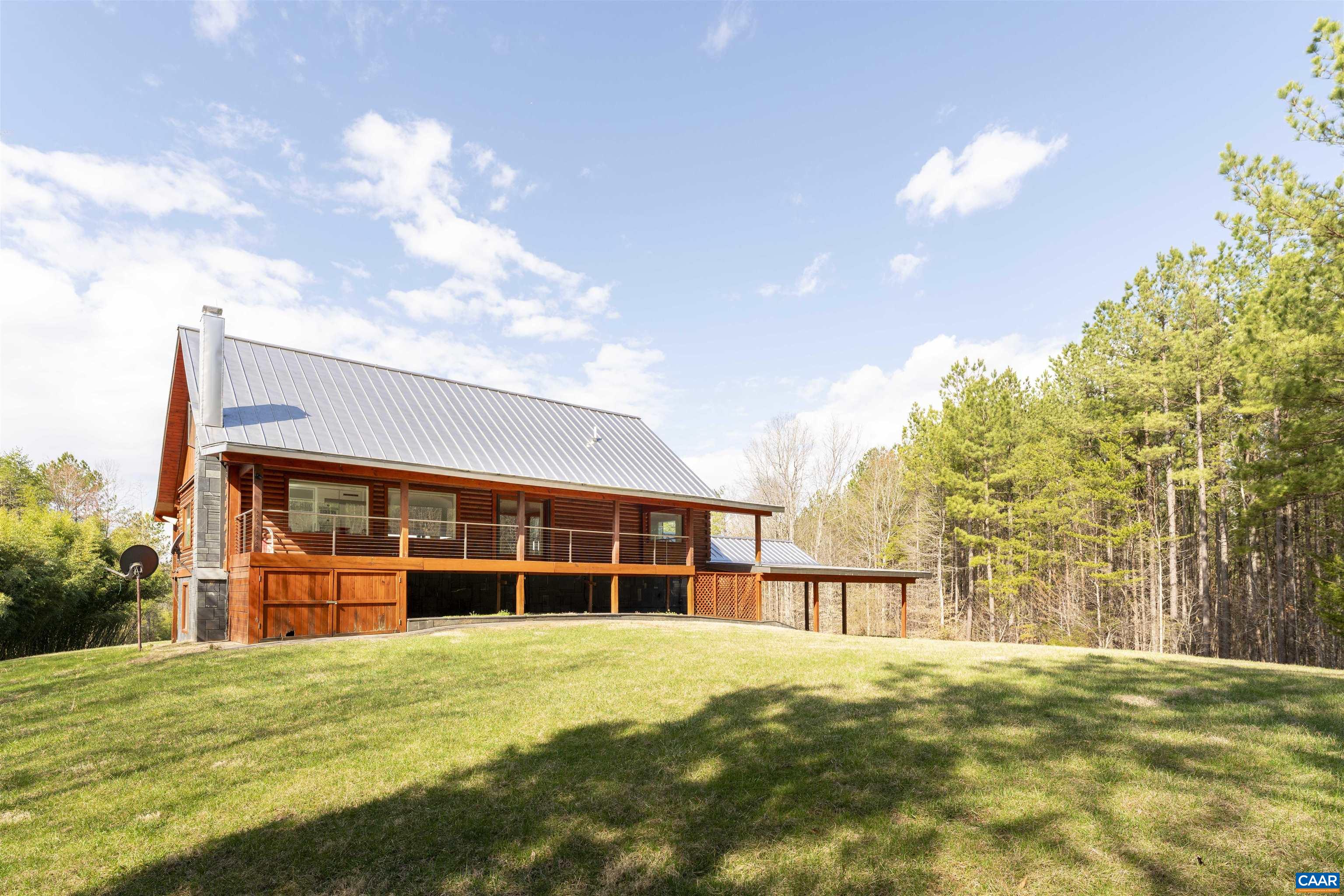 4323 Carter Road Schuyler, VA 22969 - Photo 4 of 54 a view of a house with a backyard