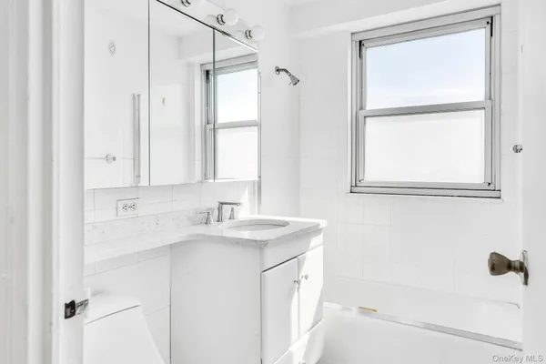 a bathroom with a sink and a bathtub