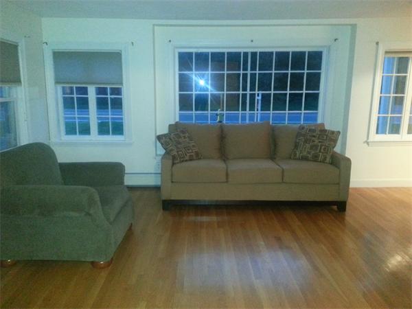 370 South Main Street Andover, MA 01810 - Photo 2 of 8 a living room with furniture and a window