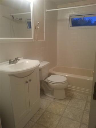 370 South Main Street Andover, MA 01810 - Photo 5 of 8 a bathroom with a toilet sink and a mirror