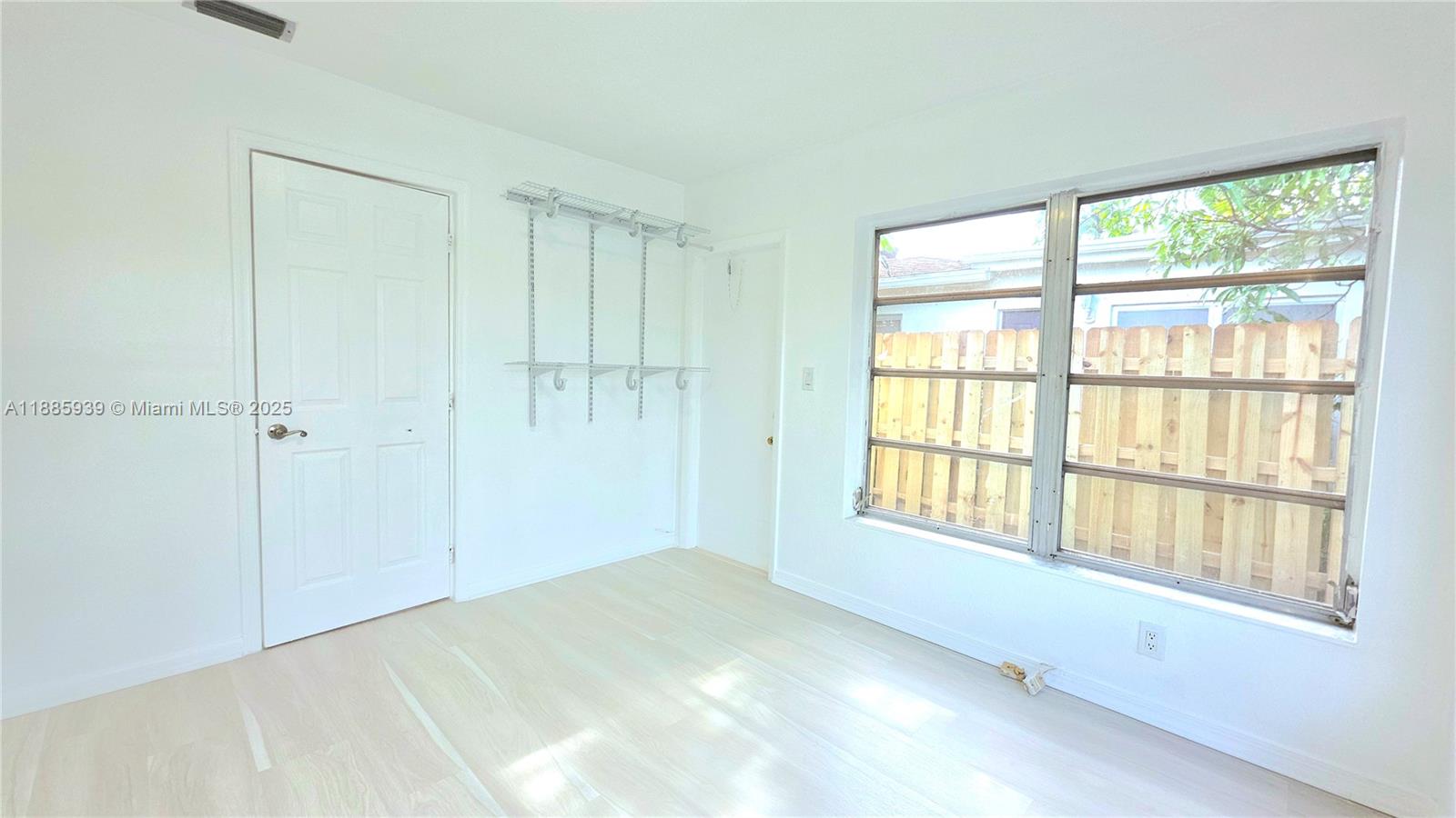 5300 Southwest 7th Court Margate, FL 33068 - Photo 14 of 18 a view of an empty room with a window