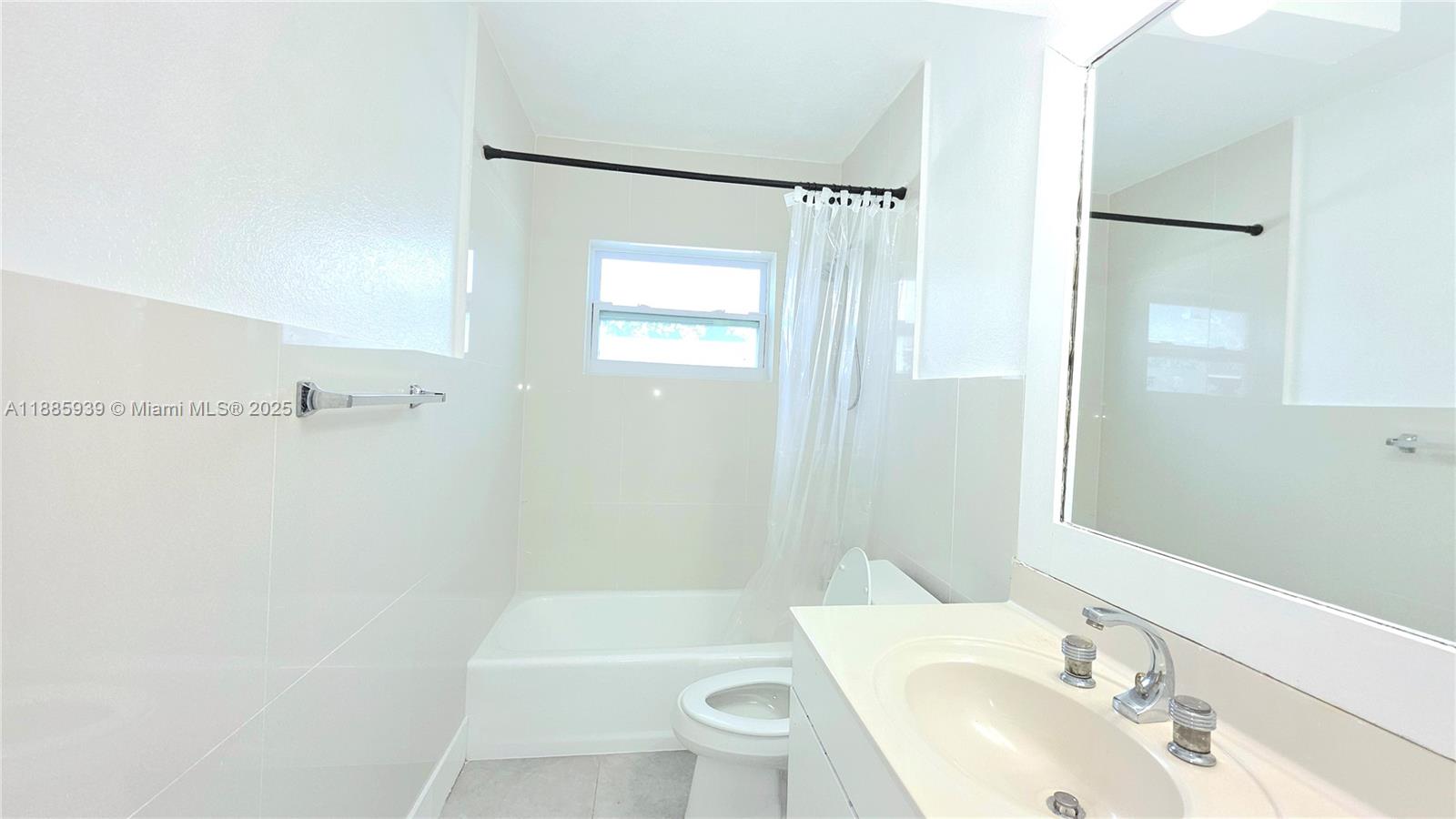 5300 Southwest 7th Court Margate, FL 33068 - Photo 15 of 18 a bathroom with a sink a toilet and shower
