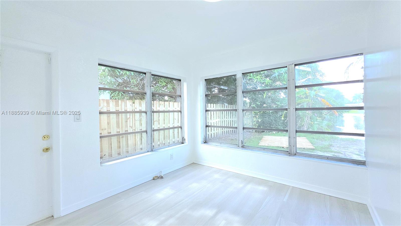 5300 Southwest 7th Court Margate, FL 33068 - Photo 8 of 18 a view of an empty room with a window