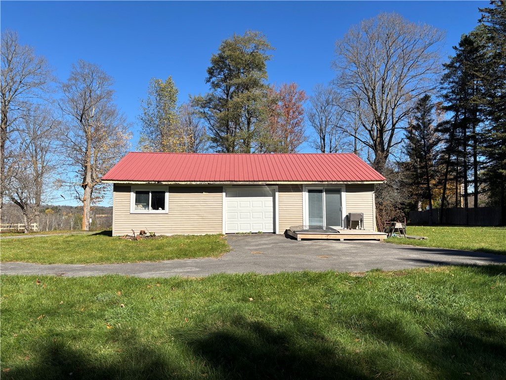 164 Millstone Road Warren, NY 13439 - Photo 27 of 38 Rec room entrance with deck