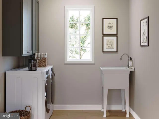 a bathroom with a sink and a window