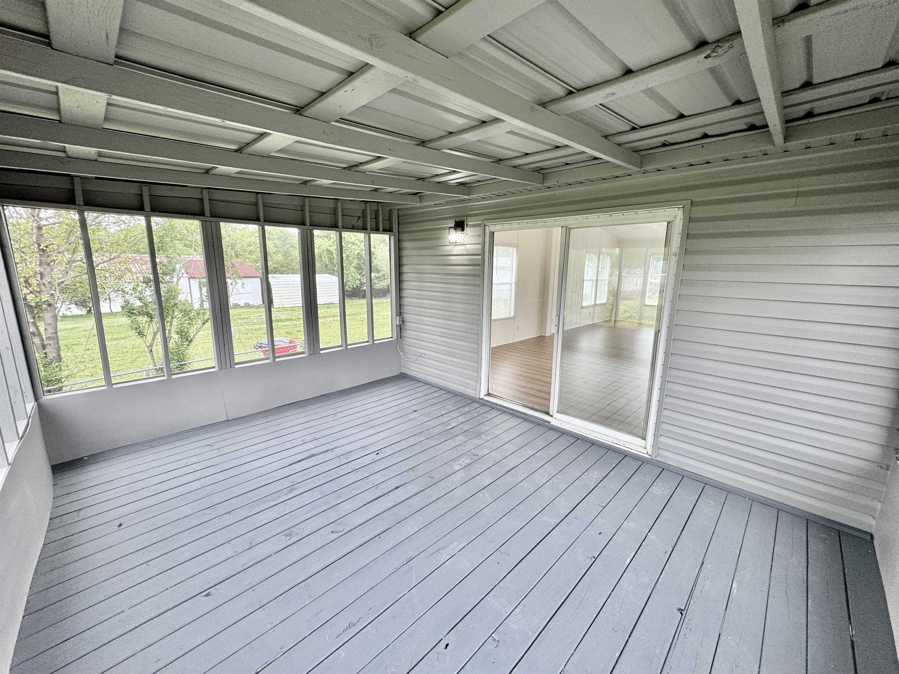 841 Simmons Road Drummonds, TN 38023 - Photo 25 of 35 Unfurnished sunroom with healthy amount of natural light
