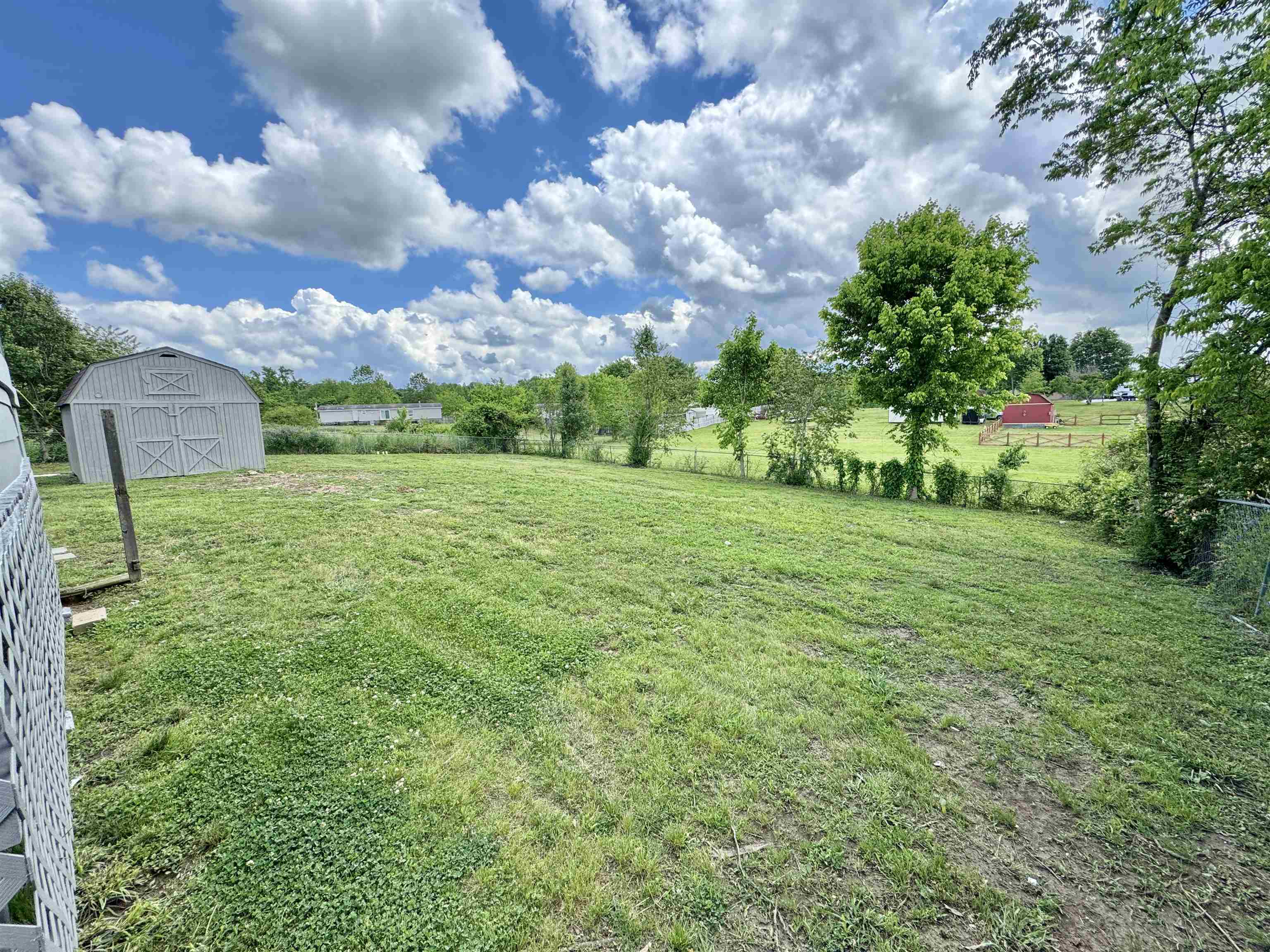841 Simmons Road Drummonds, TN 38023 - Photo 29 of 35 View of yard with an outbuilding and a barn