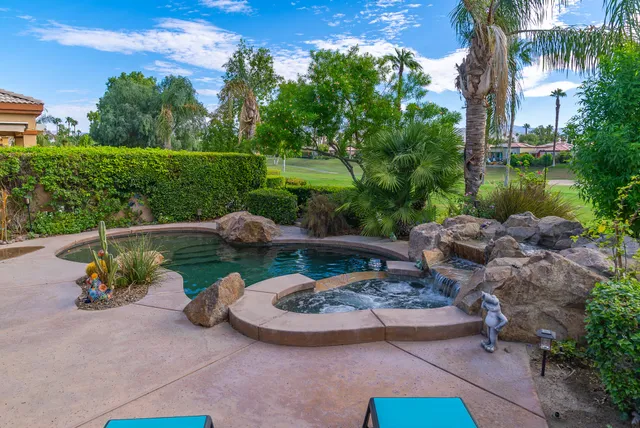 a view of a garden with an outdoor space