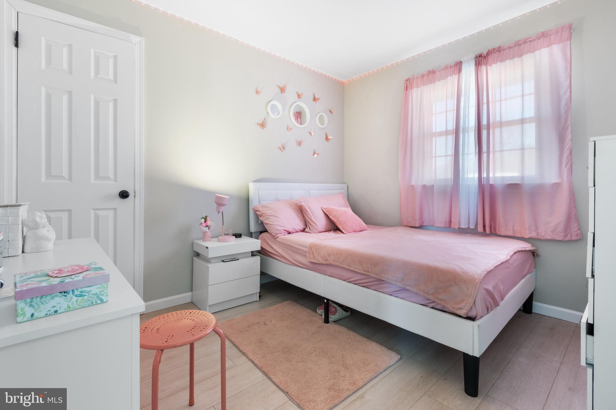 25 Latimer Way Burlington, NJ 08016 - Photo 18 of 28 a bedroom with a bed and window