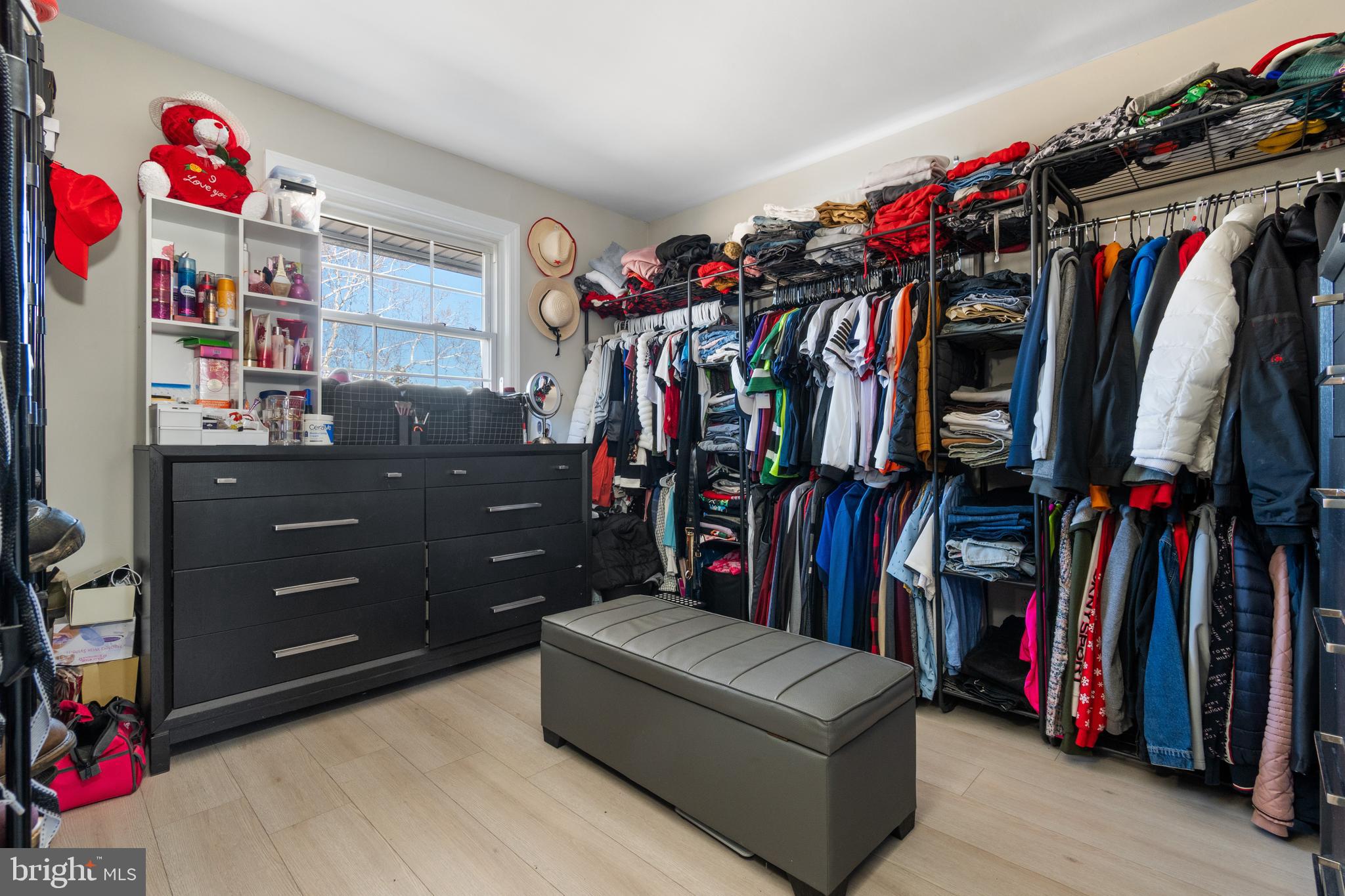 25 Latimer Way Burlington, NJ 08016 - Photo 19 of 28 a view of walk in closet with clothes