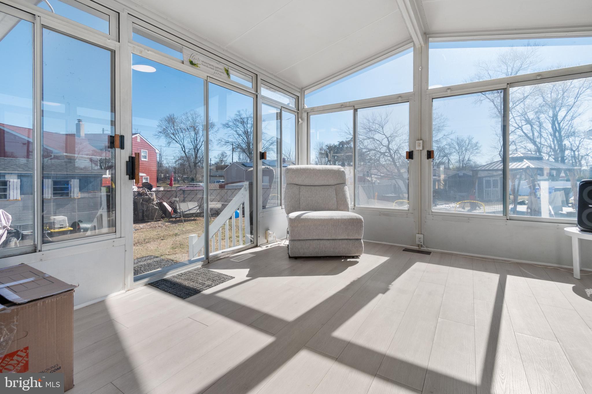 25 Latimer Way Burlington, NJ 08016 - Photo 7 of 28 a living room with a large window and a table