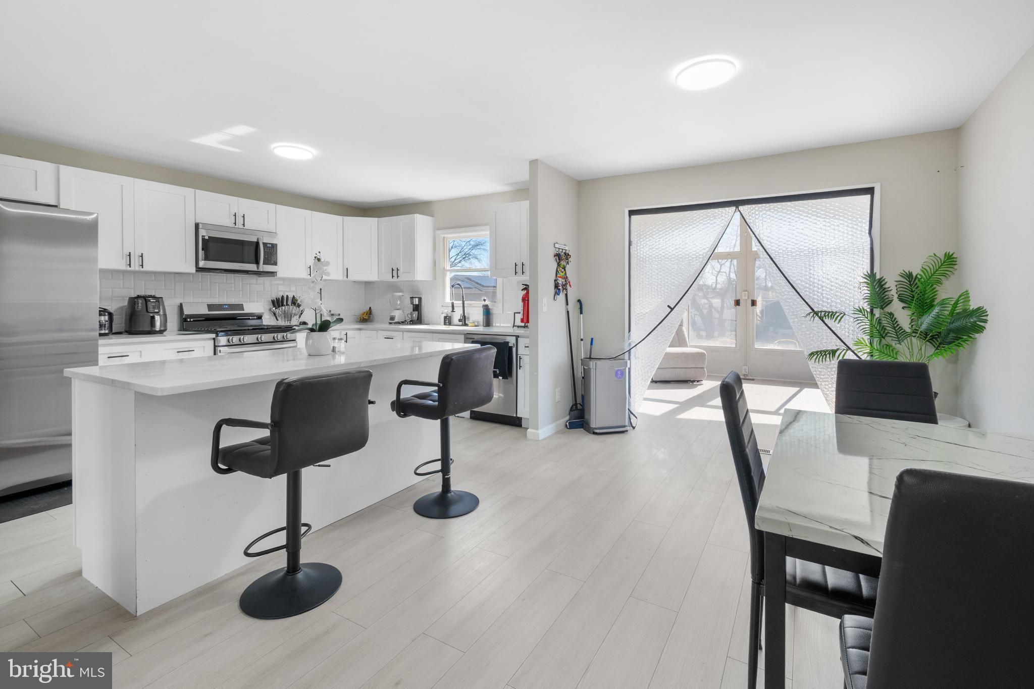 25 Latimer Way Burlington, NJ 08016 - Photo 9 of 28 a view of a dining room with furniture window and outside view