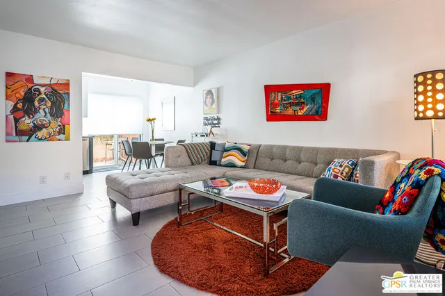 a living room with furniture and a couch