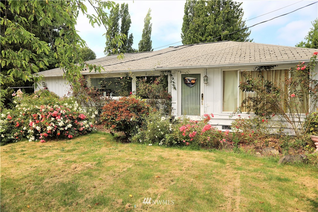 11204 Southeast Petrovitsky Road Renton, WA 98055 - Photo 2 of 37 a front view of a house