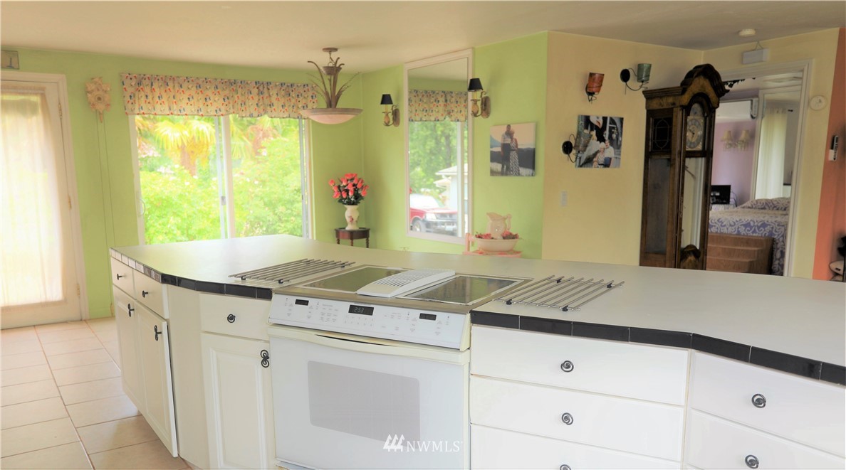11204 Southeast Petrovitsky Road Renton, WA 98055 - Photo 8 of 37 a view of a kitchen with a stove
