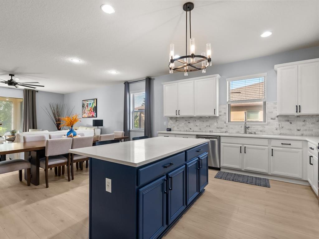 30021 Donnington Loop Mount Dora, FL 32757 - Photo 12 of 40 a large kitchen with lots of counter space