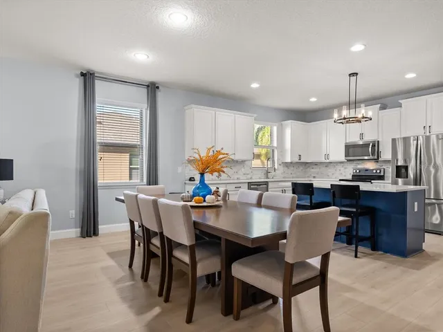 a view of a dining room with furniture
